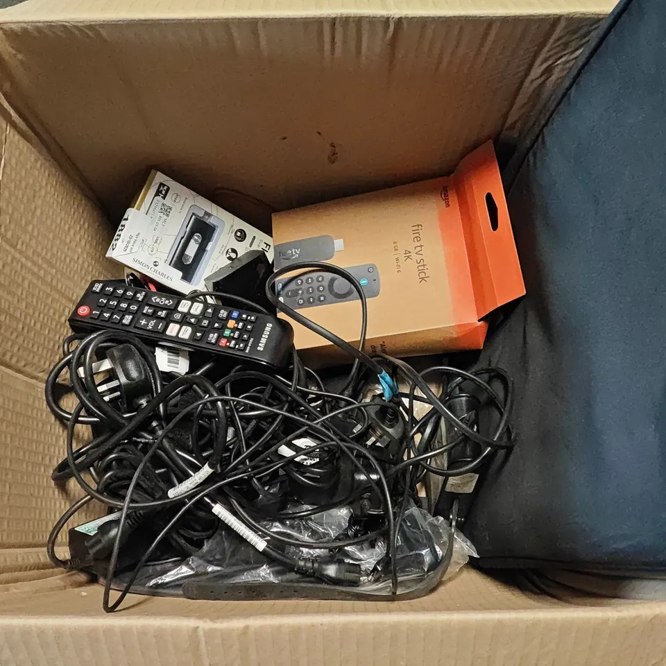 LOT OF ASSORTED TECH ITEMS TO INCLUDE FIRE TV STICK, LAPTOP POWER SUPPLIES AND SAMSUNG REMOTES
