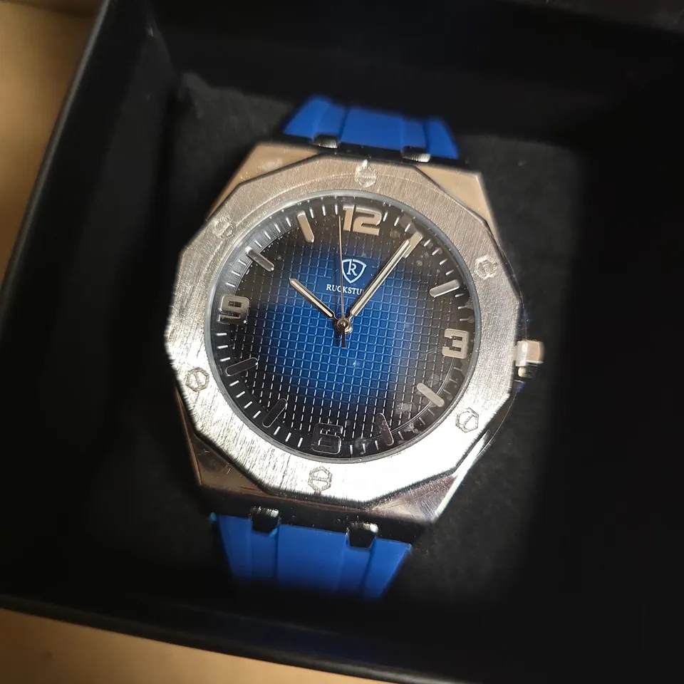 RUCKSTUHL STEEL WRISTWATCH WITH BLACK/BLUE FACE AND BLUE RUBBER STRAP