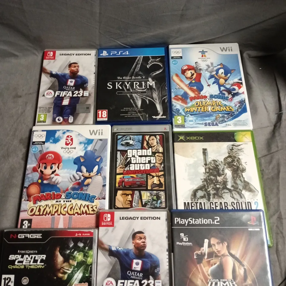 9 X ASSORTED VIDEO GAMES TO INCLUDE SKYRIM, METAL GEAR SOLID 2, TOMB RAIDER ETC 