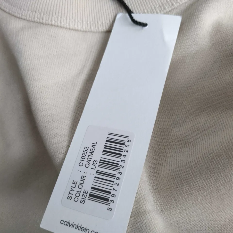 CALVIN KLEIN SWEATSHIRT – OATMEAL WITH CK LOGO PATCH UK L