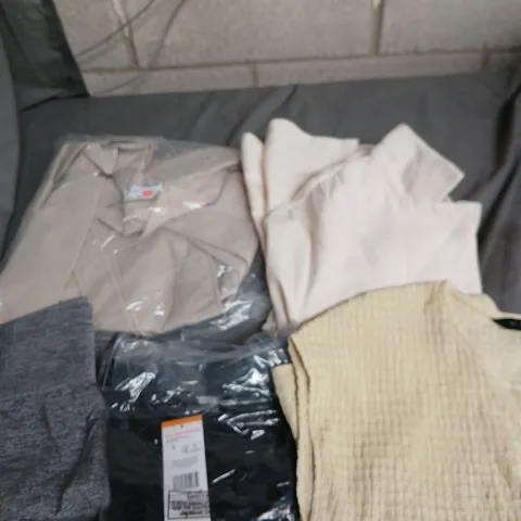 APPROXIMATELY 20 ASSORTED CLOTHING PRODUCTS IN VARIOUS STYLES & SIZES TO INCLUDE PANTS, T-SHIRTS, DRESSES ETC