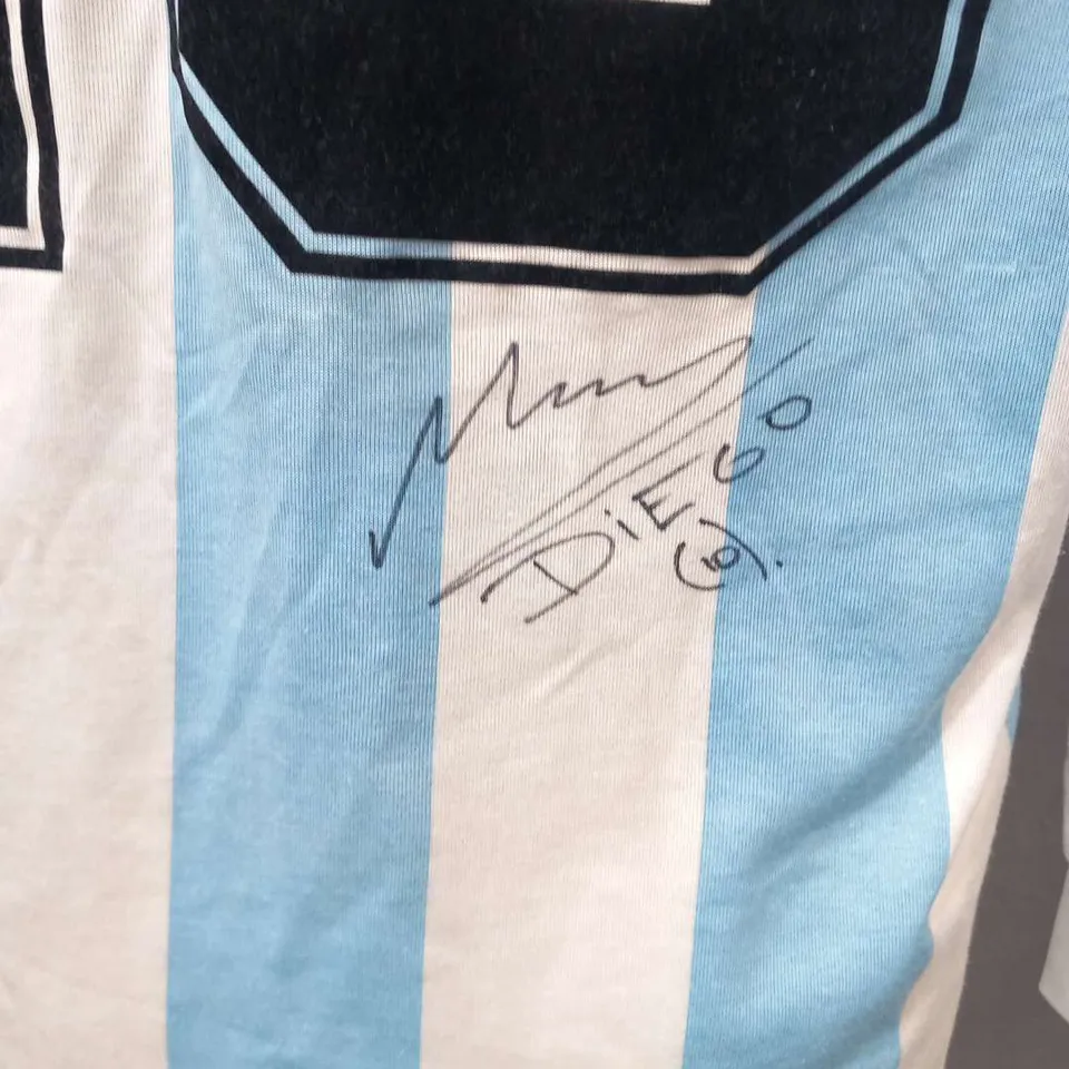 1994 ARGENTINA ADIDAS HOME FOOTBALL JERSEY NUMBERED 10 SIGNED BY DIEGO ARMANDO MARADONA WITH CERTIFICATE OF AUTHENTICITY