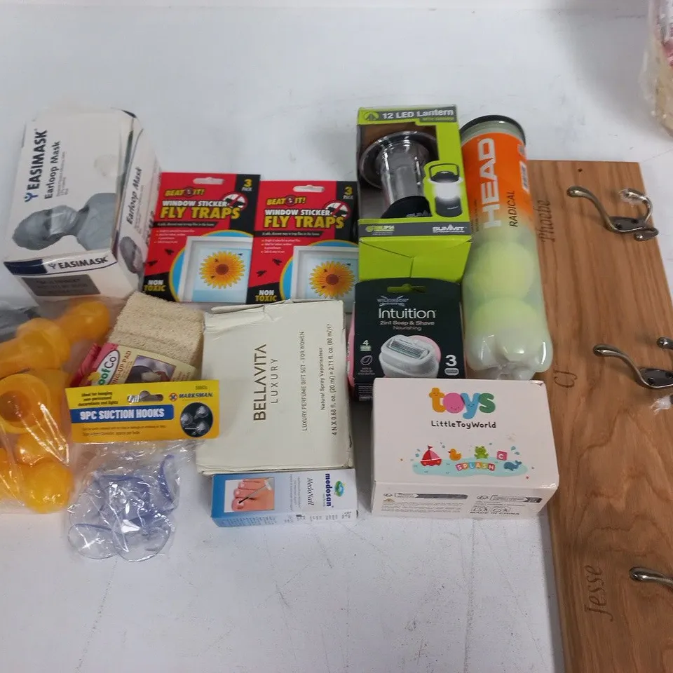 LARGE QUANTITY OF ASSORTED HOUSEHOLD ITEMS TO INCLUDE HEAD TENNIS BALLS, EARLOOP MASKS AND DOVE GIFT SET