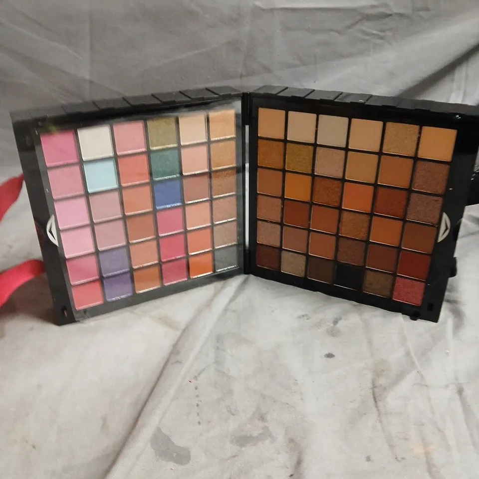 PIXIE PINK EYESHADOW PALETTE – TWO-PANEL ASSORTMENT OF PINKS, PURPLES, BLUES AND BROWNS