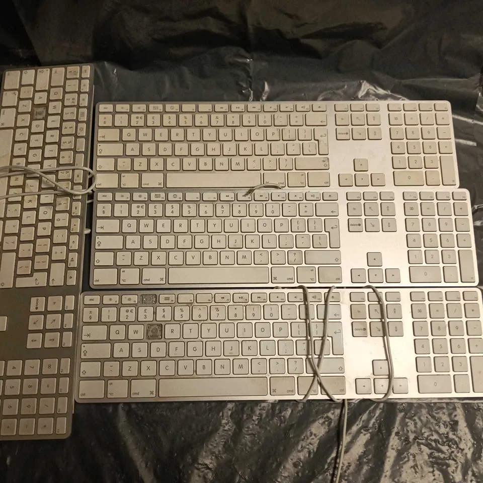LOT OF 4 WIRED APPLE KEYBOARDS 