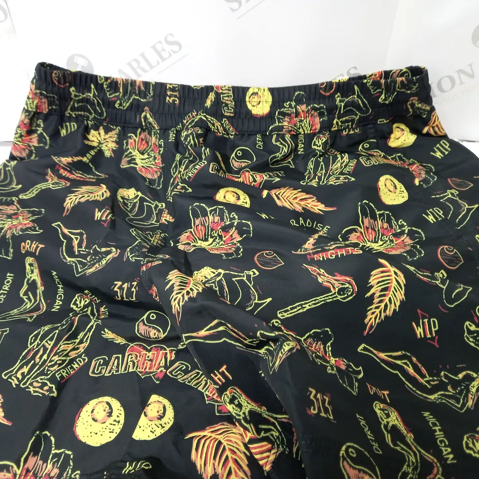 CARHARTT DRIFT SWIM TRUNKS IN PARADISE PRINT IN BLACK/YELLOW - SMALL