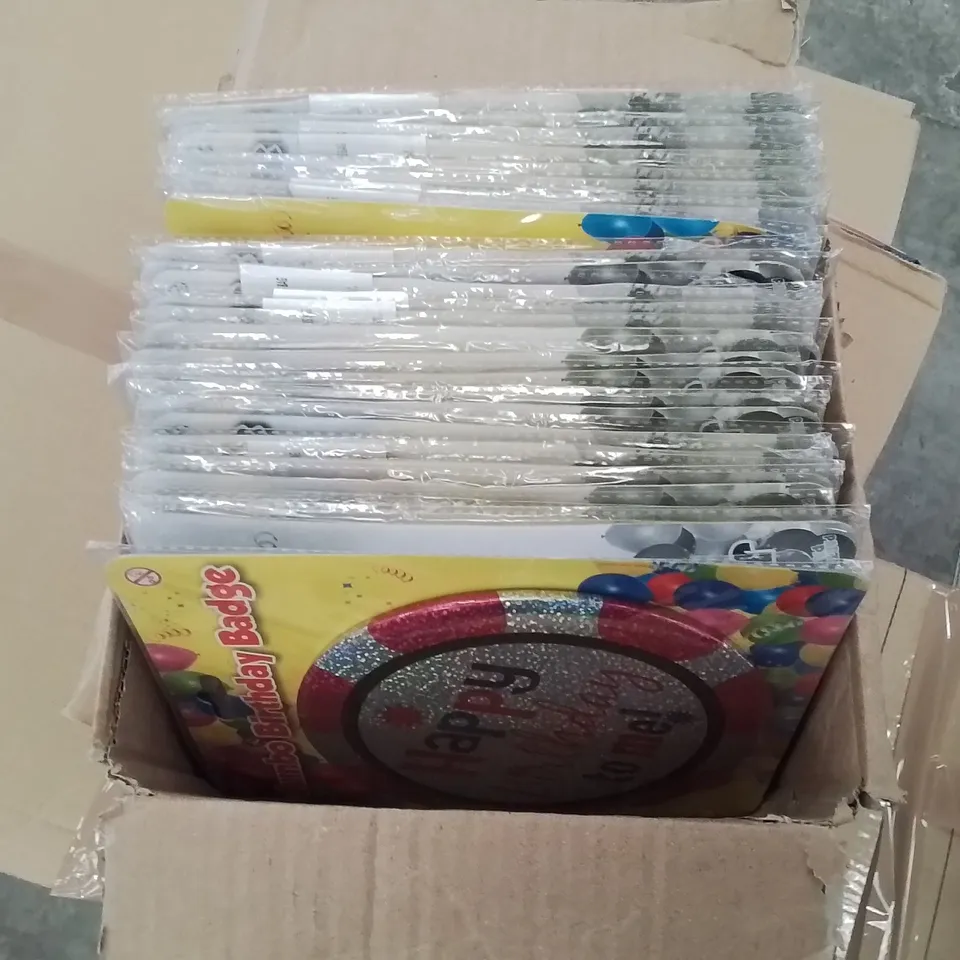 BOX CONTAINING A LARGE QUANTITY OF BRAND NEW JUMBO BIRTHDAY BADGES