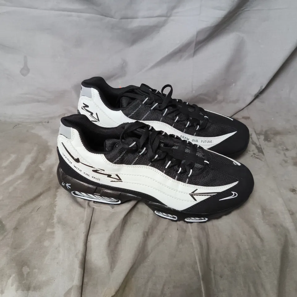 UNBOXED NIKE AIR DRAW OUR FUTURE BLACK AND WHITE TRAINERS UK SIZE 11.5