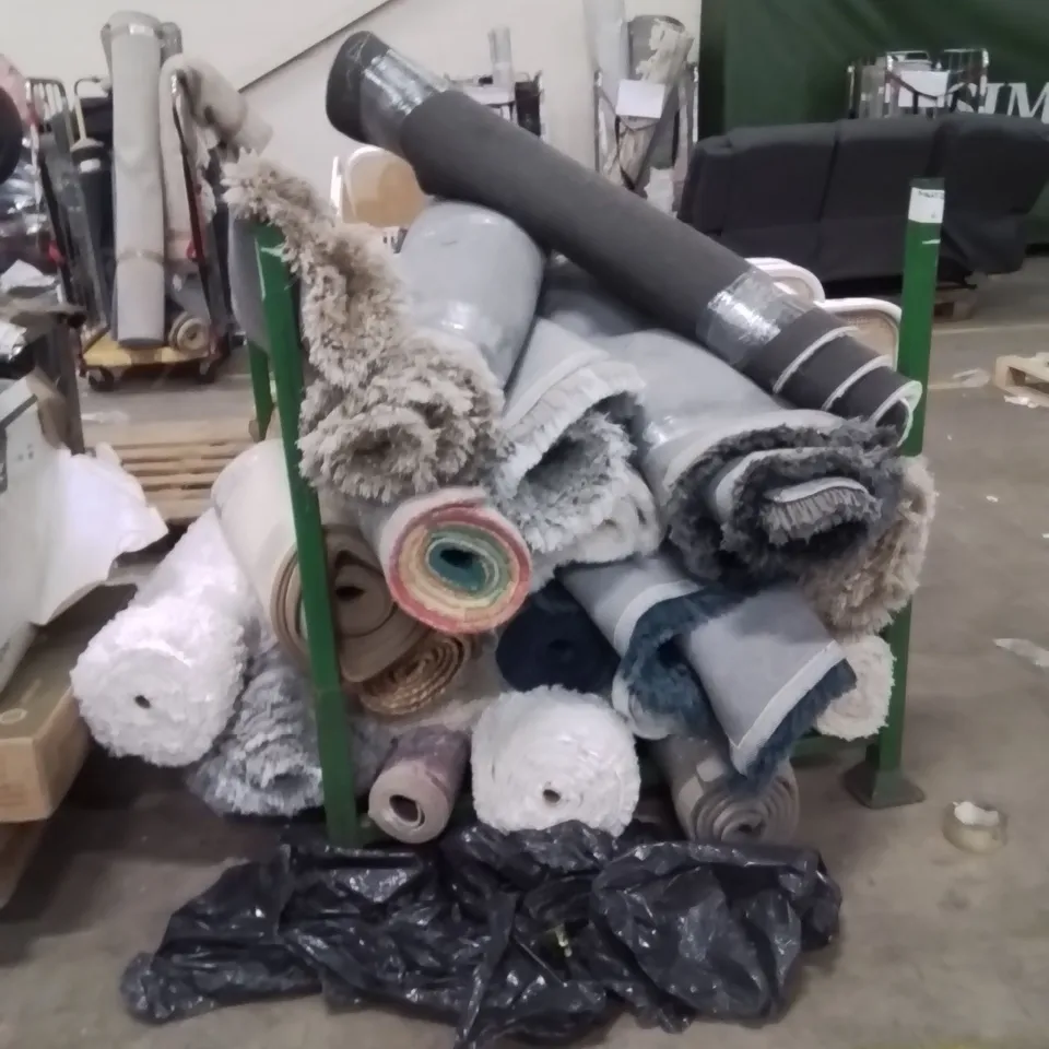 STILLAGE OF APPROXIMATELY 15 QUALITY DESIGNER RUGS