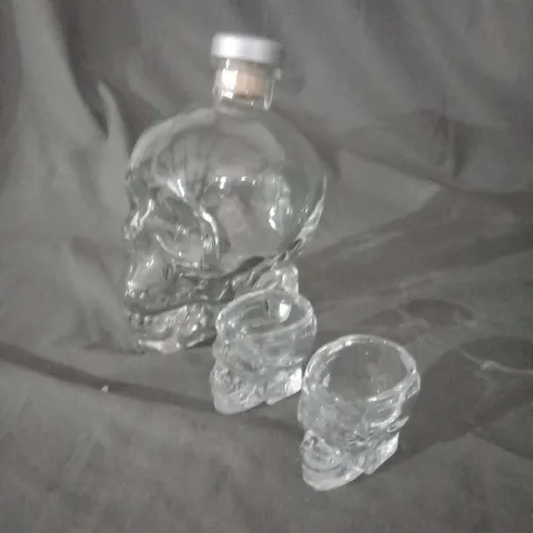 SKULL GLASS BOTTLE AND FOUR SHOT GLASSES