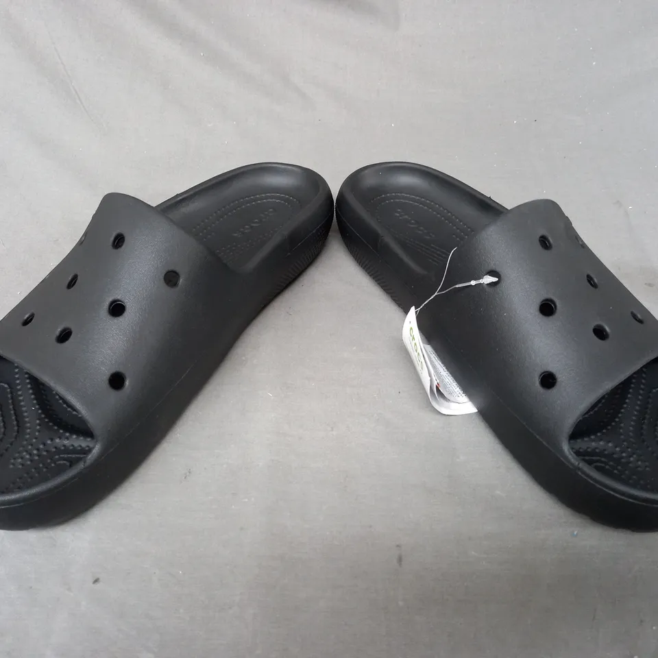 PAIR OF CROCS SLIDERS IN BLACK UK SIZE M11/W12