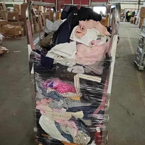 CAGE OF ASSORTED CLOTHING ITEMS TO INCLUDE MERRELL, RIHOAS AND UNDER ARMOUR