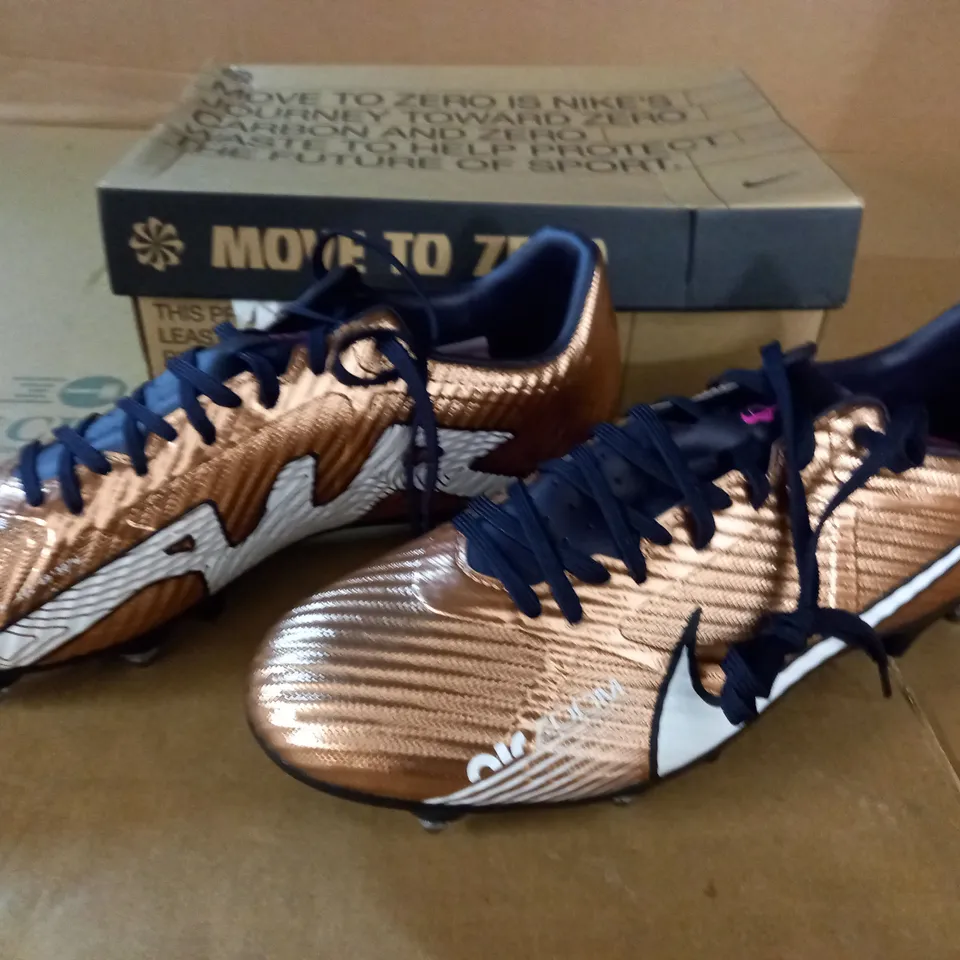 PAIR OF NIKE ZOOM VAPOR 15 ACAD SG-PRO BOOTS IN GOLD - UK 7