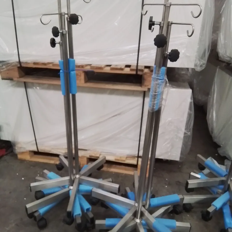 6 ASSORTED STAINLESS STEEL WHEELED DRIP STANDS