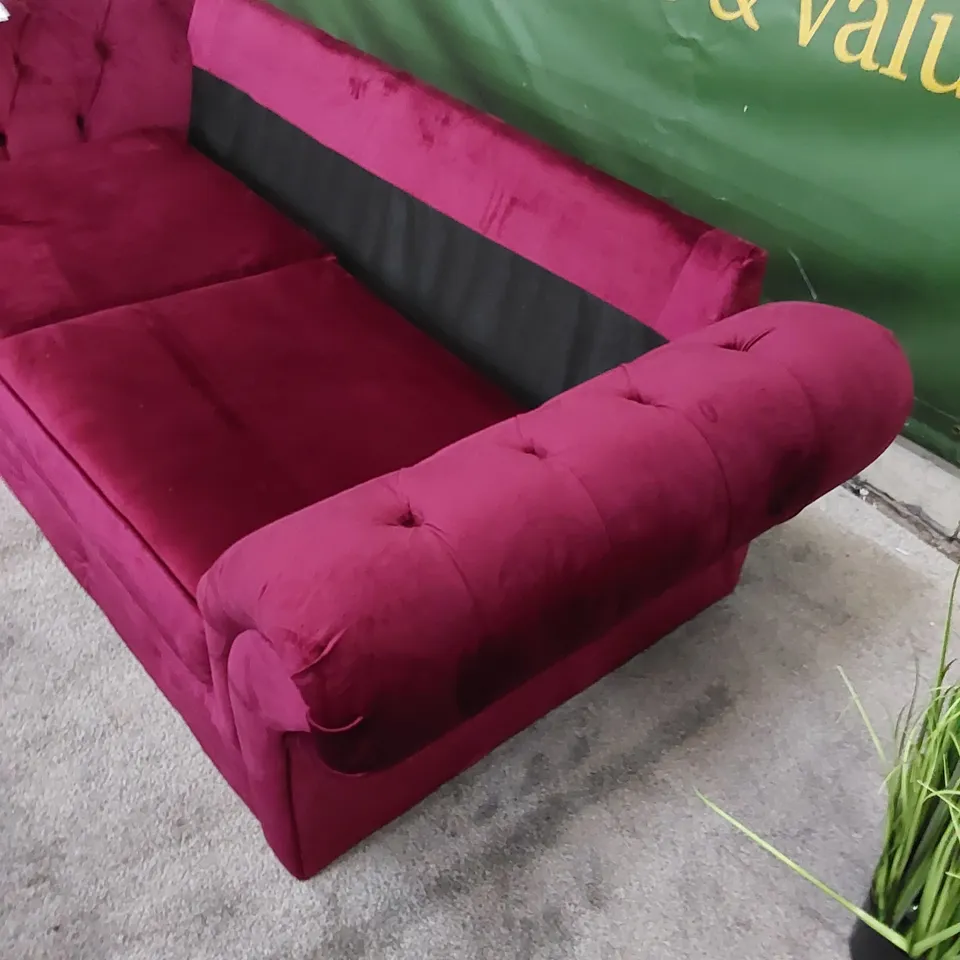 DESIGNER SOFA UPHOLSTERED IN BURGUNDY FABRIC 