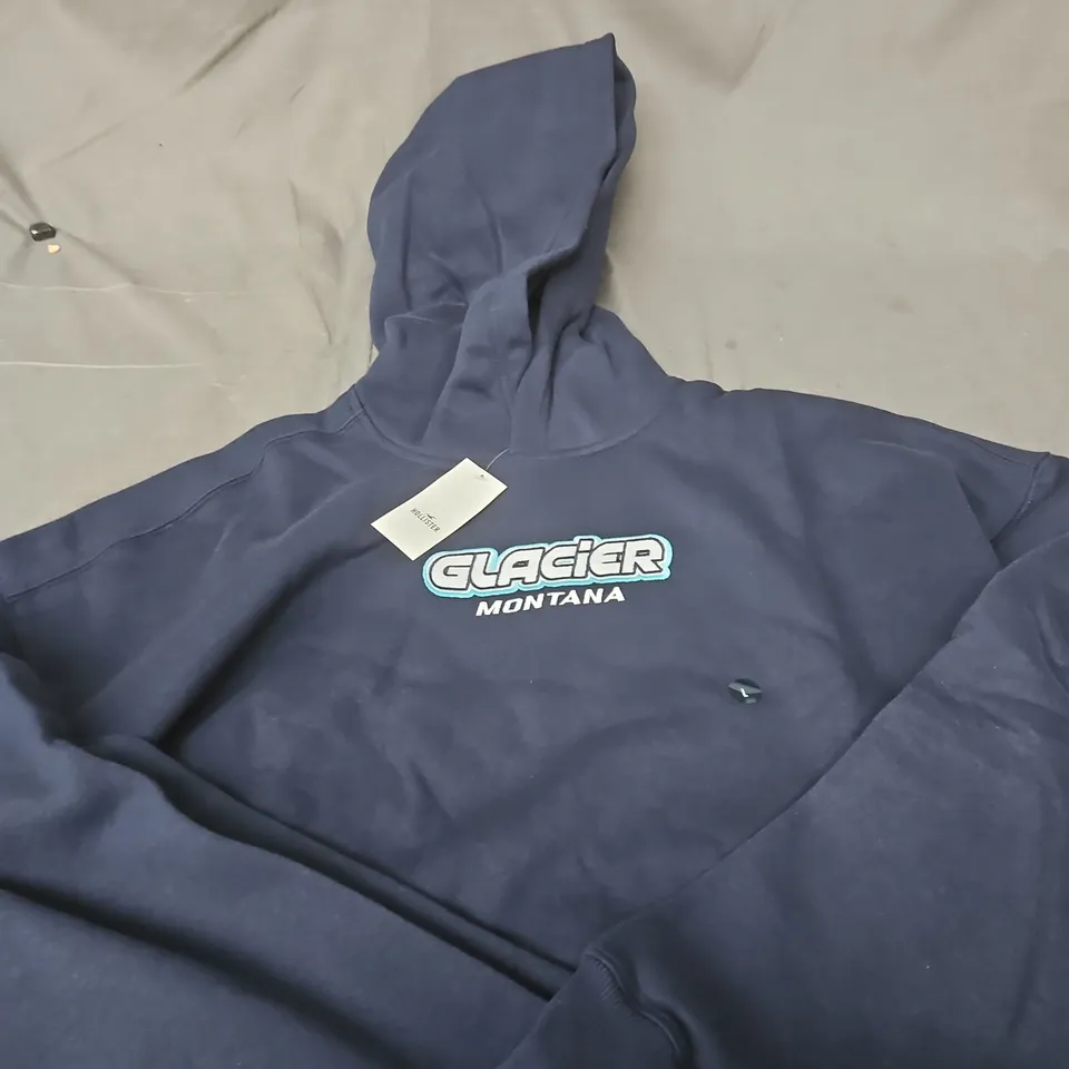 HOLLISTER HOODIE – NAVY WITH GLACIER MONTANA GRAPHIC, SIZE LARGE
