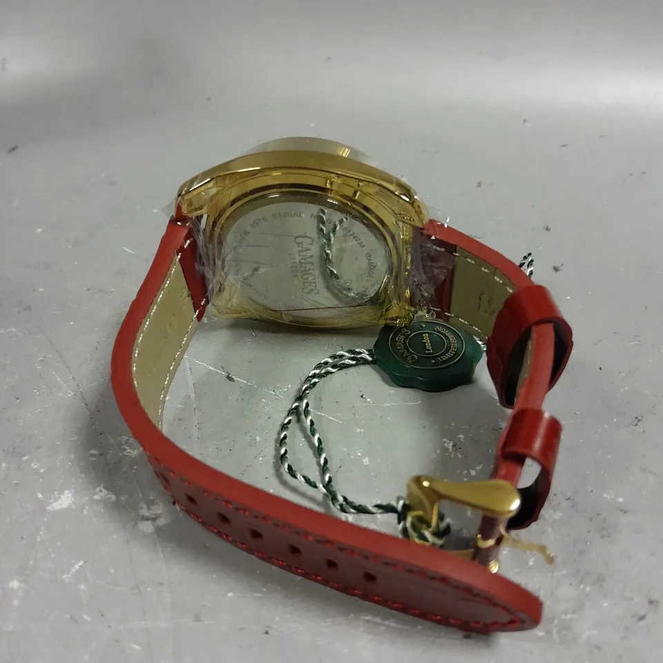 GAMAGES STATURE GOLD CASING RED DIAL WATCH 