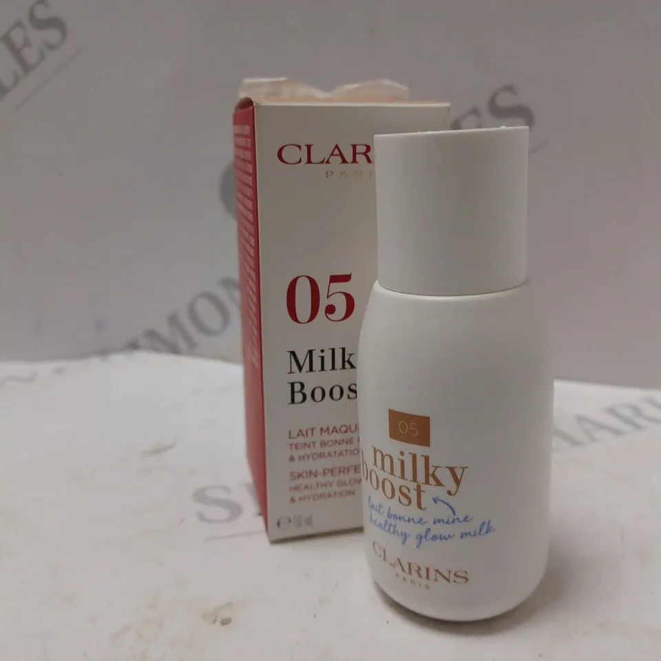 BOXED CLARINS 05 MILKY SANDALWOOD SKIN-PERFECTING MILK (50ml)