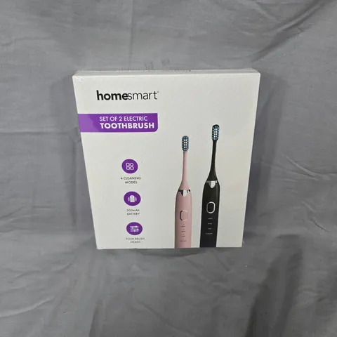 BOXED AND SEALED HOMESMART ELECTRIC TOOTHBRUSH SET OF 2 – PINK & BLACK