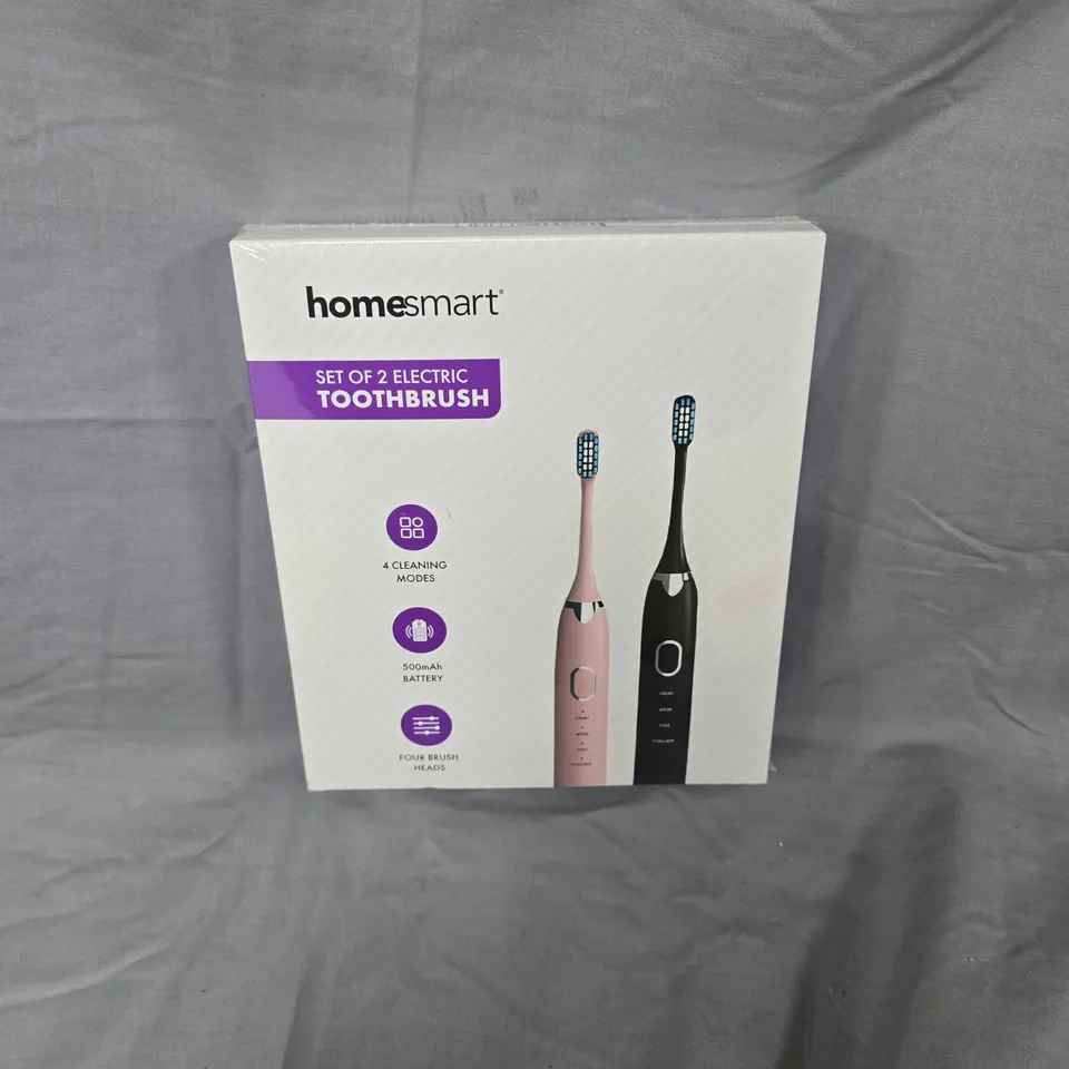 BOXED AND SEALED HOMESMART ELECTRIC TOOTHBRUSH SET OF 2 – PINK & BLACK