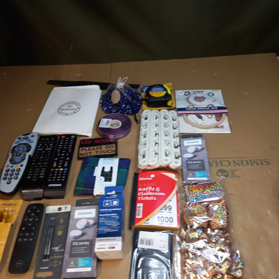 LOT OF ASSORTED ITEMS TO INCLUDE REMOTE CONTROLS, TAPE MEASURES AND DECOR STONES