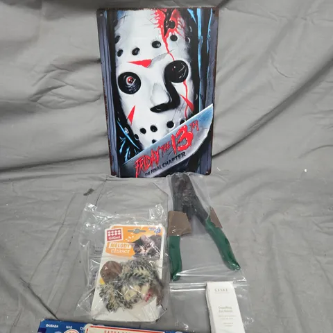 APPROXIMATELY 15 ASSORTED HOUSEHOLD ITEMS TO INCLUDE FRIDAY THE 13TH PLAQUE, CAT TOY MELODY CHASER AND GESKE EYE SERUM