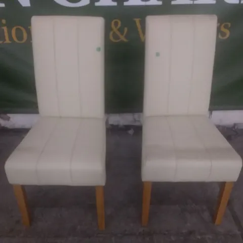 SET OF 2 NEW IVORY LEATHER DINING CHAIRS (OAK LEG)