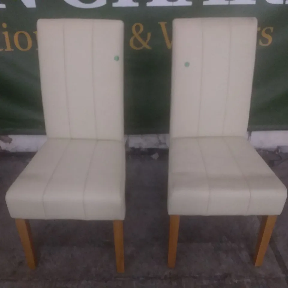 SET OF 2 NEW IVORY LEATHER DINING CHAIRS (OAK LEG)