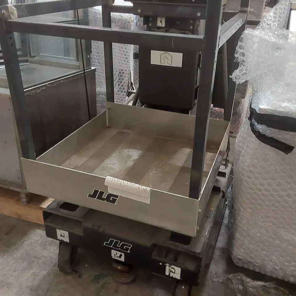 JLG 15 AMI SINGLE VERTICAL MAST BOOM LIFT