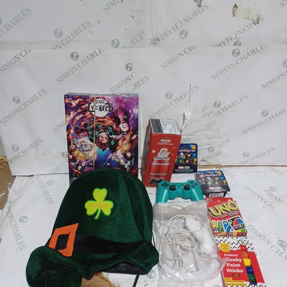 MEDIUM BOX OF ASSORTED TOYS TO INCUDE PLAYSTATION CONTROLLER, UNO CARDS AND NOVELTY HATS