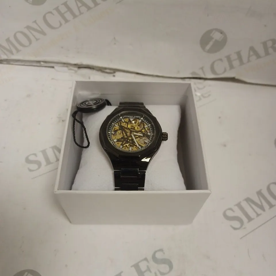 BOXED ANTHONY JAMES GENTS SPORTS SKELETON WATCH WITH STAINLESS STEEL BRACELET - 3ATM. 