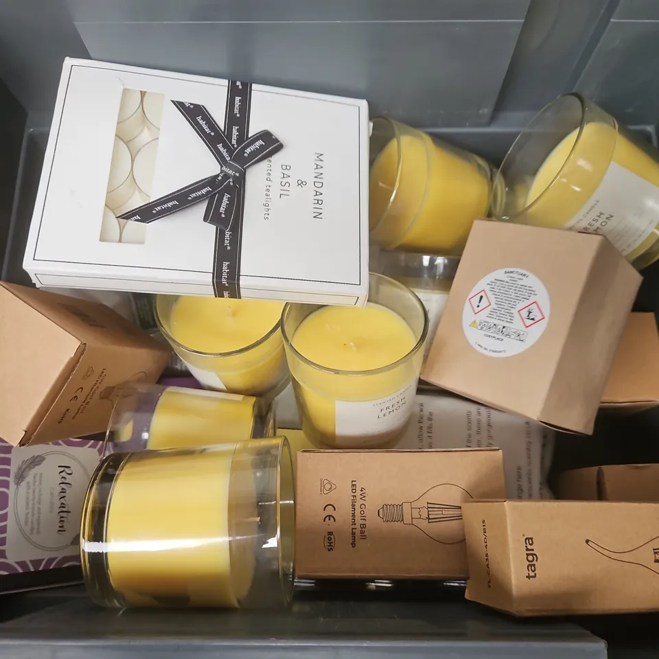 APPROXIMATELY 12 ASSORTED HOUSEHOLD ITEMS TO INCLUDE SCENTED CANDLES, SCENTED TEALIGHTS, BULBS, ETC - COLLECTION ONLY