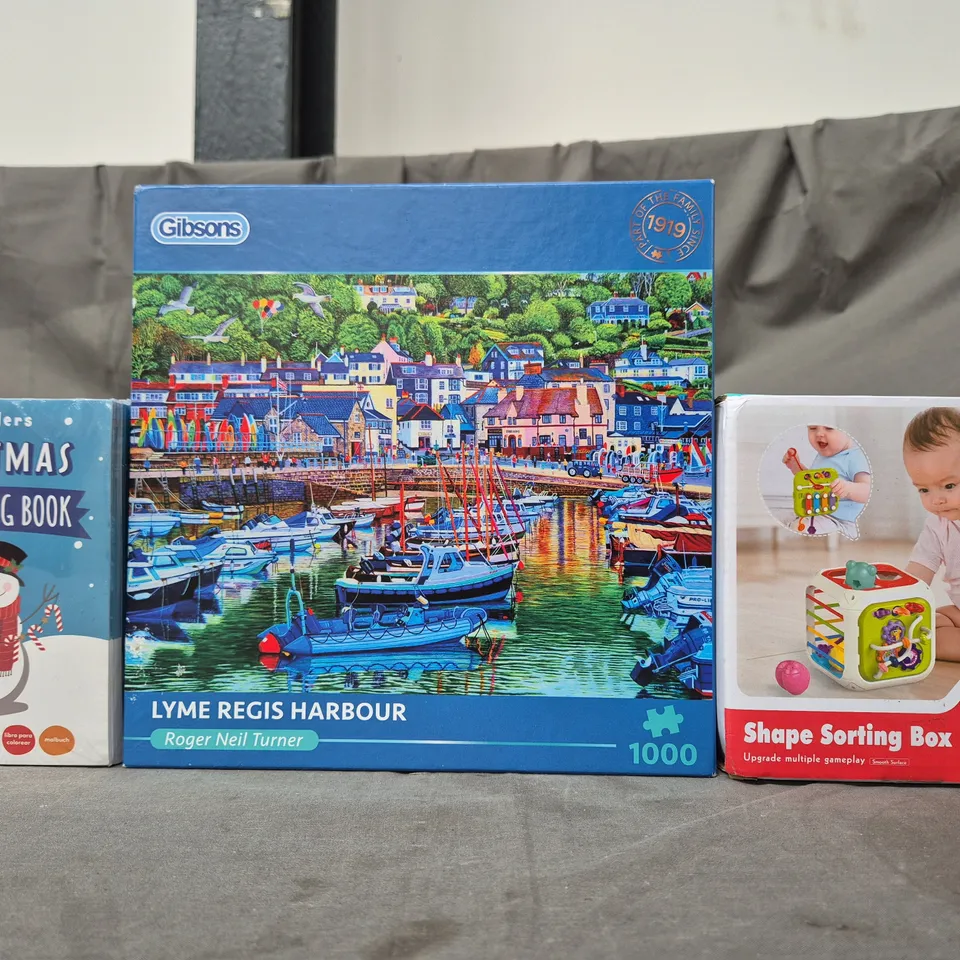 BOX OF APPROXIMATELY 20 ASSORTED TOYS AND GAMES TO INCLUDE CHRISTMAS COLOURING BOOK, LYME REGIS HARBOUR PUZZLE, SHAPE SORTING BOX, ETC - COLLECTION ONLY