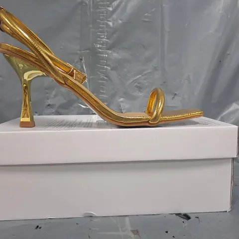 BOXED PAIR OF UNBRANDED OPEN TOE STRAPPY HEELED SANDALS IN METALLIC GOLD SIZE EU 42