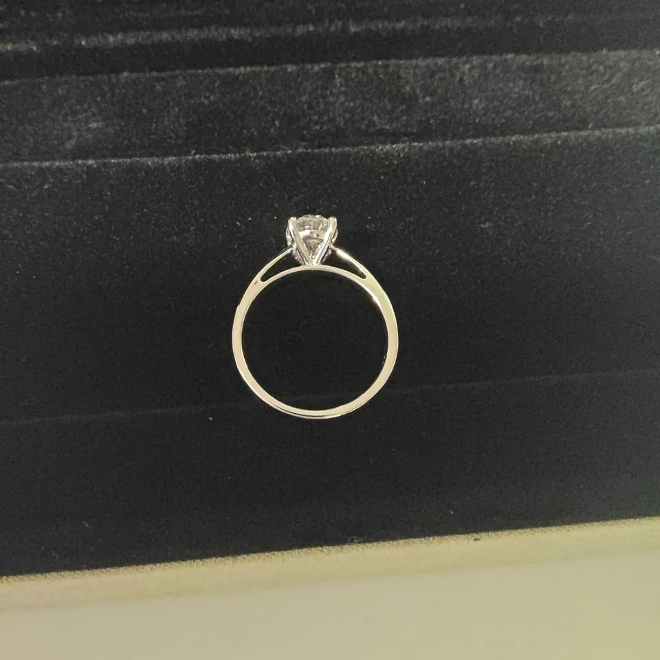 9CT WHITE GOLD SOLITAIRE RING SET WITH A LAB GROWN OVAL CUR DIAMOND WEIGHING +-1.53CT