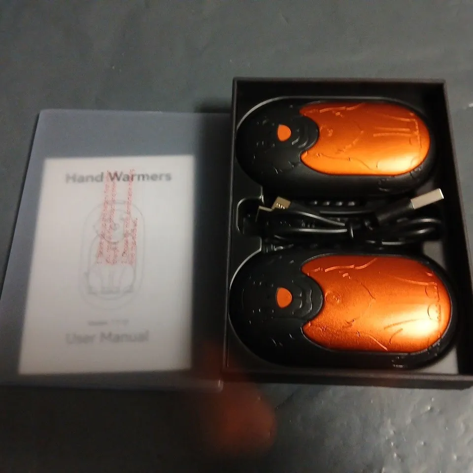 BOXED PAIR OF HAND WARMERS 