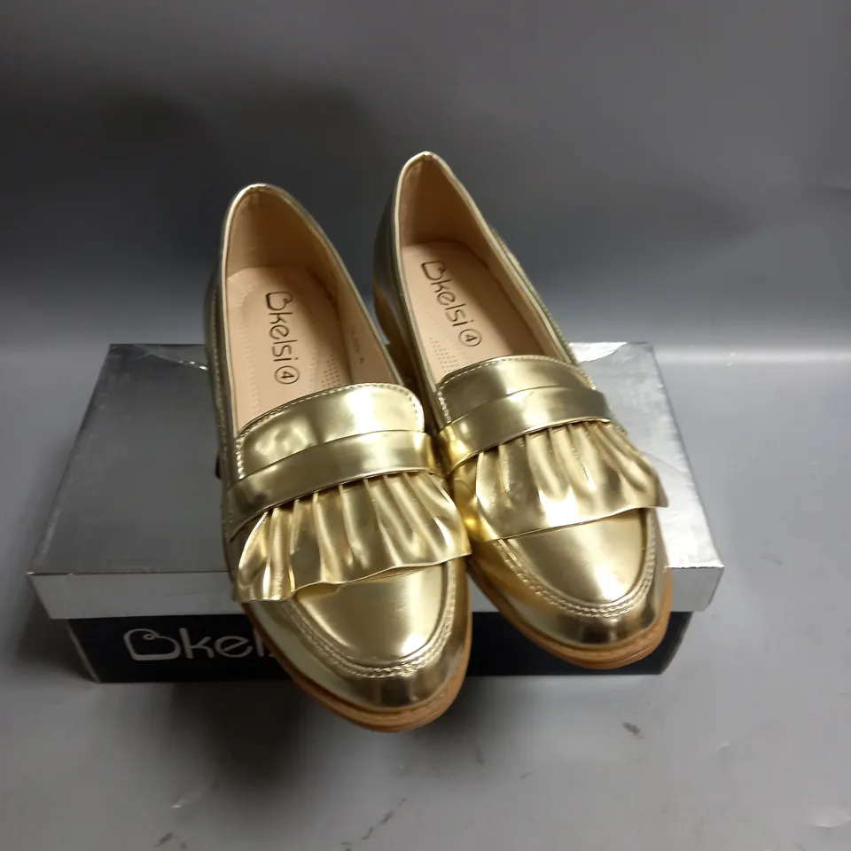 BOXED KELSI LADIES FLAT GOLD BROGUES. SIZE 4