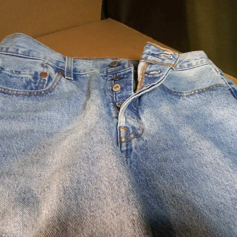 DESIGNER LIGHT BLUE RIPPED BUTTON UP JEANS