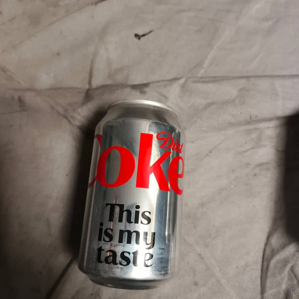 APPROXIMATELY 14 ASSORTED COKE CANS 