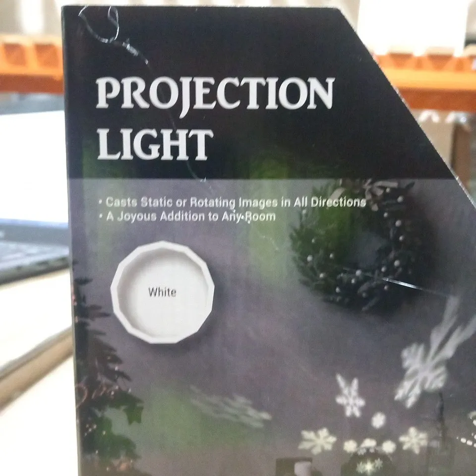 FOUR BRAND NEW BOXED WHITE SNOWFLAKE PROJECTION LIGHTS