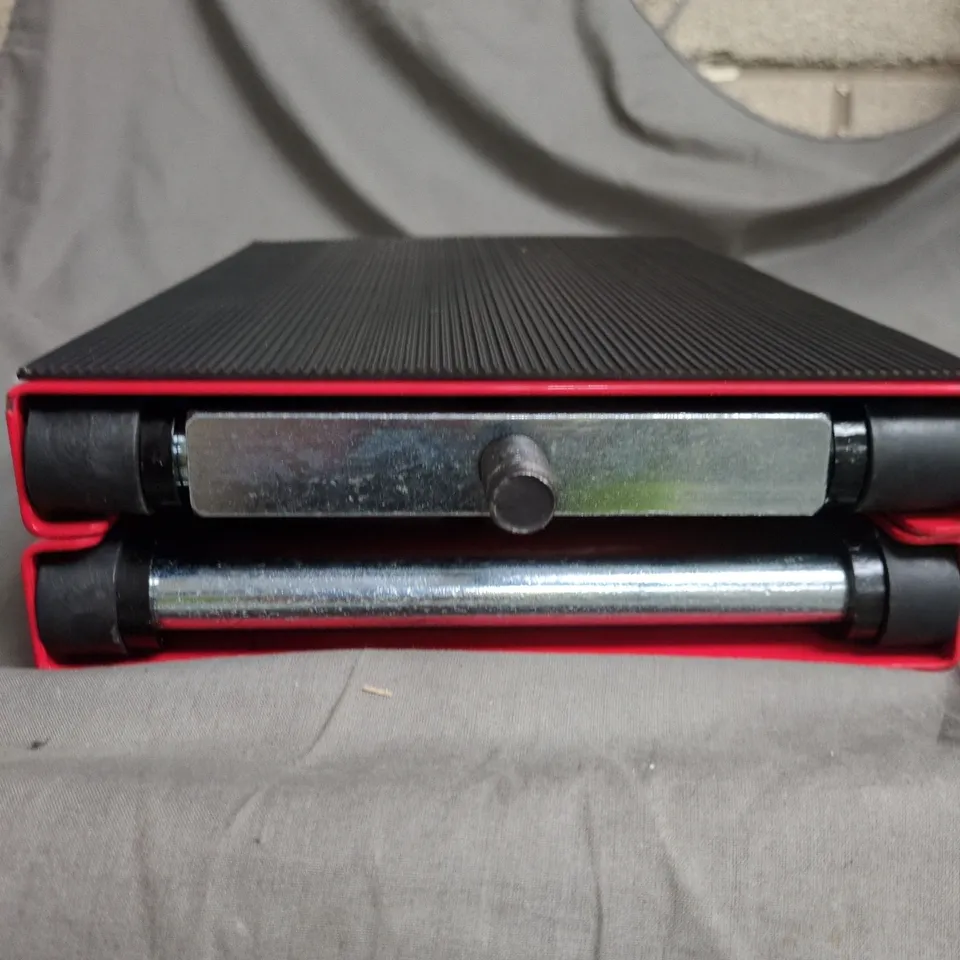 MOTORCYCLE SCISSOR LIFT JACK FOR SERVICING BIKES.