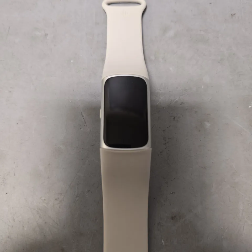FITBIT FITNESS TRACKER - MODEL UNSPEICIFED 