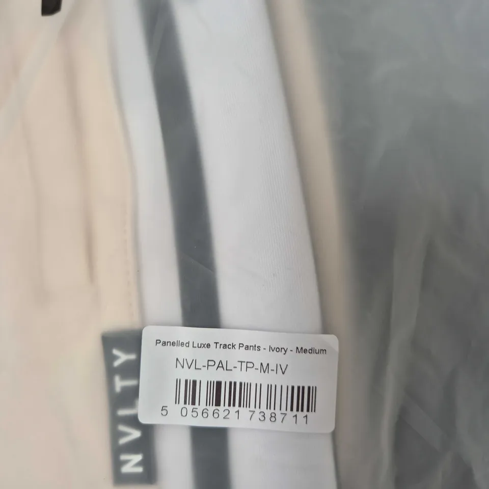 NVLTY PANELLED LUXE TRACK PANTS – IVORY – UK MEDIUM (ORIGINAL: MEDIUM)