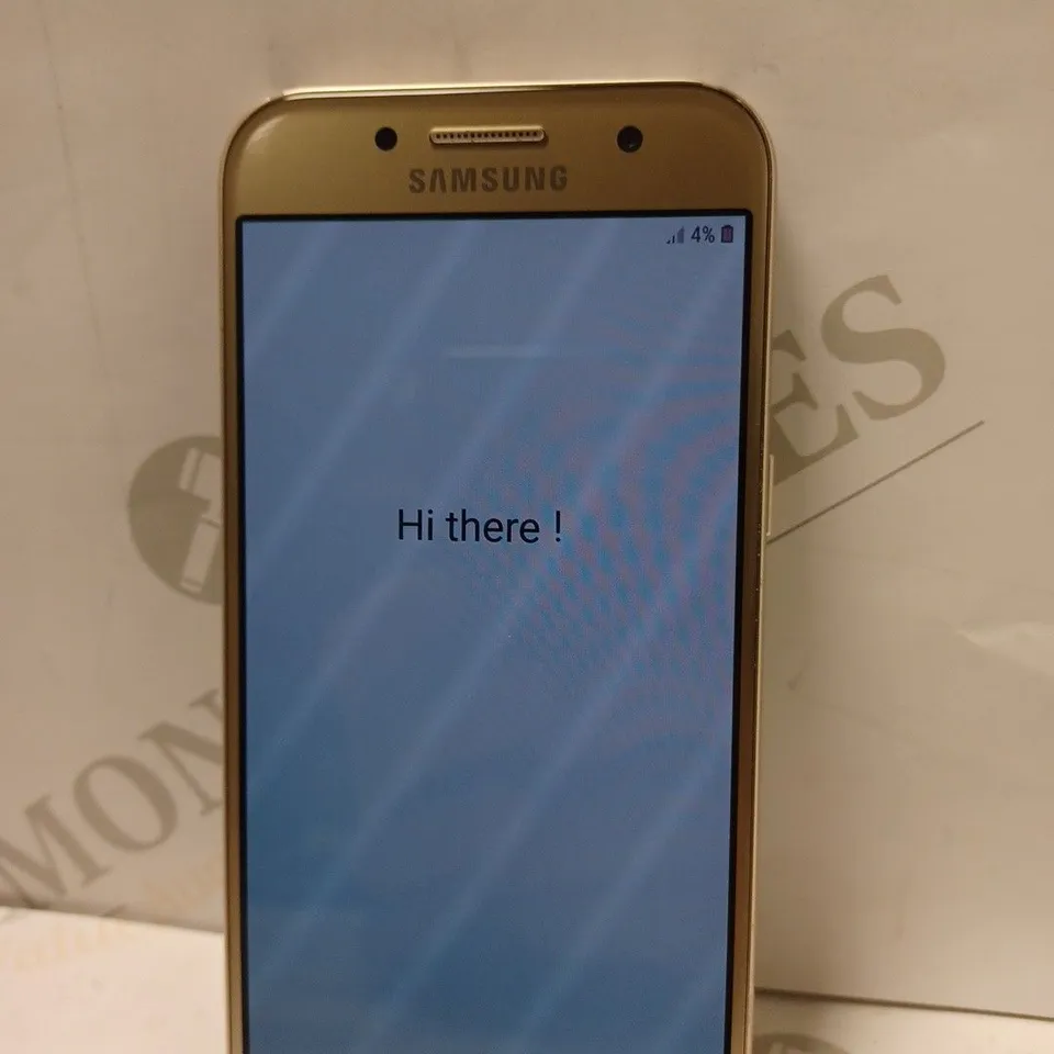 BOXED SAMSUNG GALAXY A3 MOBILE PHONE IN GOLD