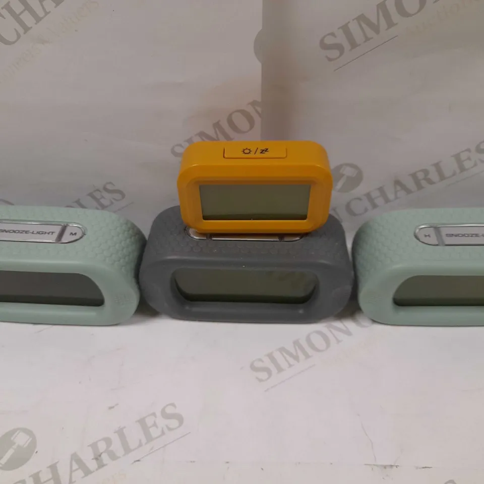 LOT OF APROX 4 ACCTIM DIGITAL CLOCKS