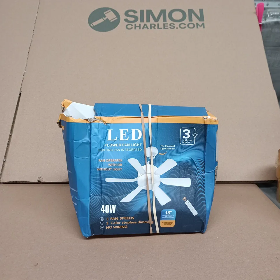 BOX OF APPROXIMATELY 20 ASSORTED GOODS INCLUDING LED FLOWER FAN LIGHT, AUDIOLINE PHONE AND BOXING GLOVES