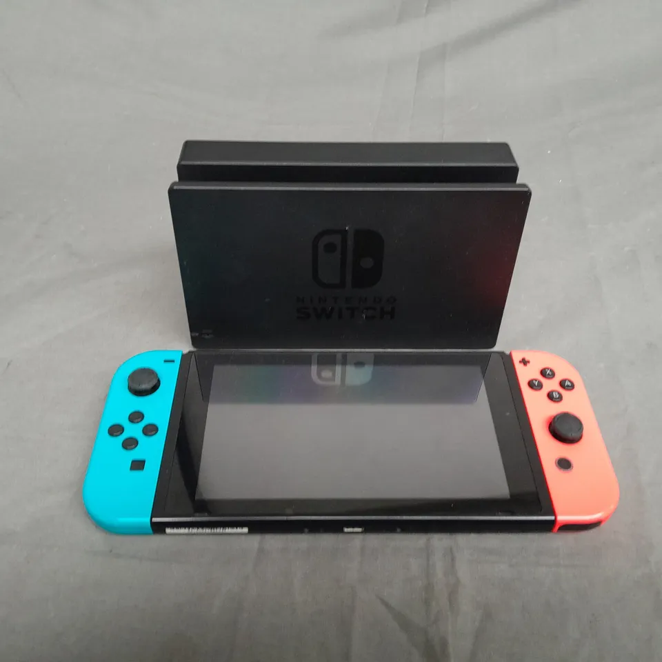 NINTENDO SWITCH AND CHARGING DOCK