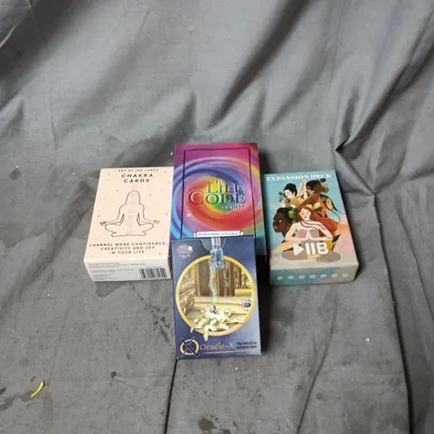 4 X NEW AGE CARD DECKS INCLUDING THE LIFE CODE TAROT, CHAKRA CARDS, ORACLE X DECK OF THE FUTURE AND PLAY PAUSE BE EXPANSION DECK