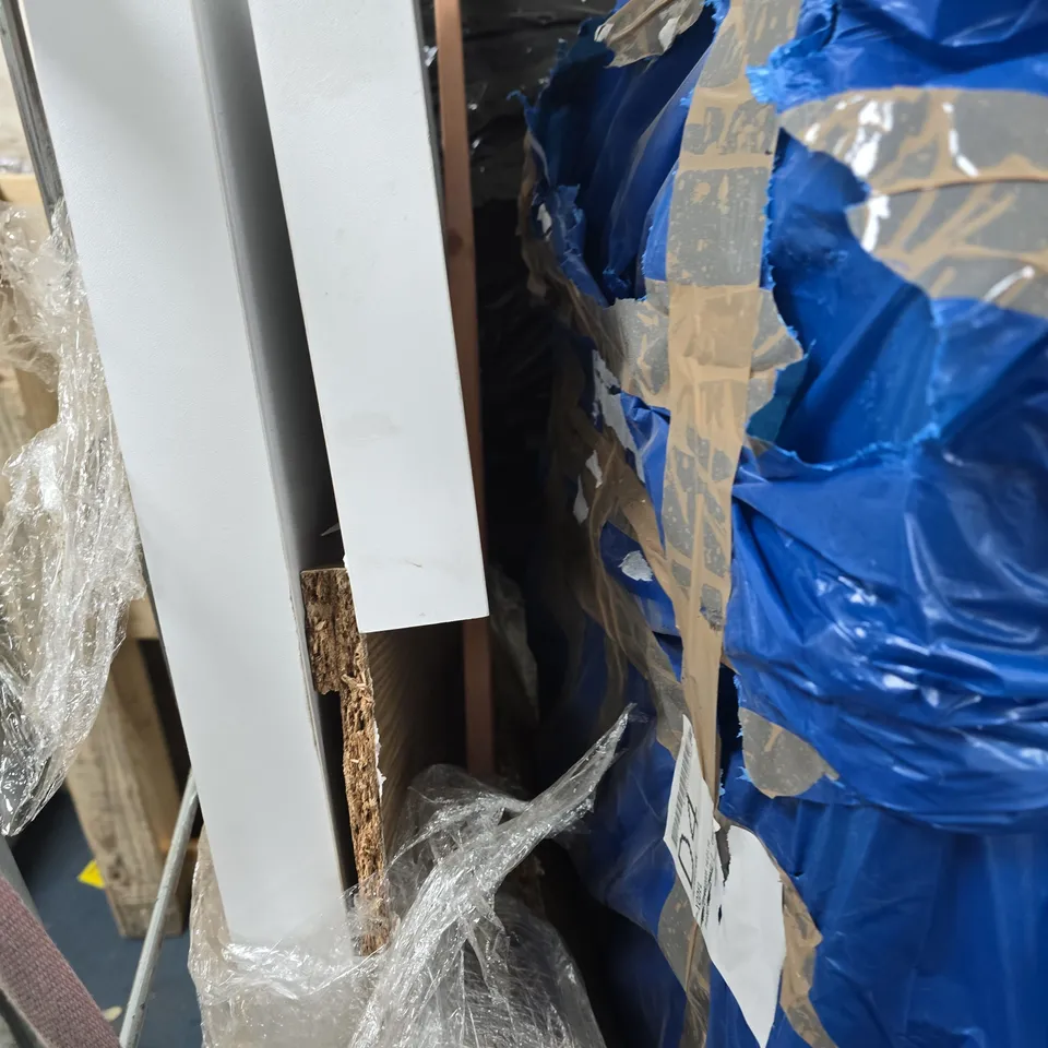 UNIDENTIFIED FURNITURE COMPONENTS ON WHEELED TROLLEY DAMAGED AND BROKEN BITS WITH MISSING PARTS . FULL CAGE 