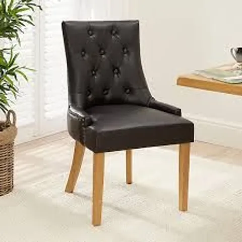 BOXED BEWLEY BLACK LEATHER BUTTON BACK DINING CHAIR, OAK LEGS 